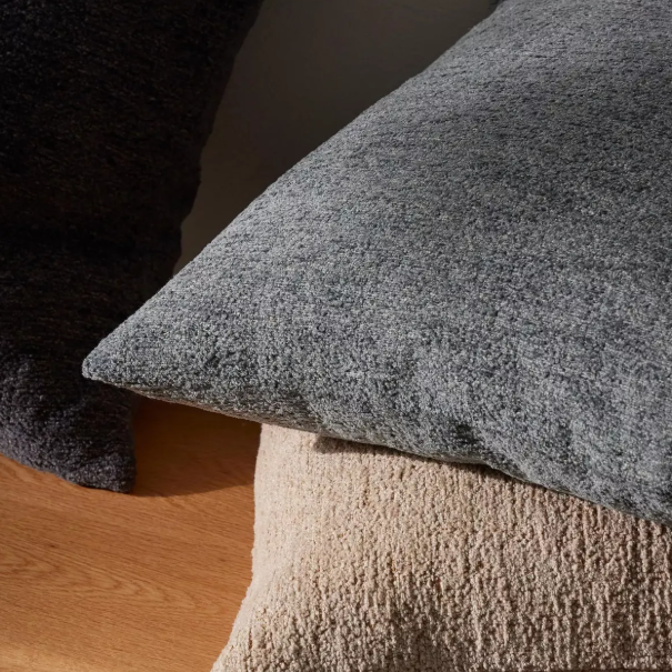 Shop the Laurent 50x50cm cushion – a rich chenille and dry yarn blend with subtle sheen, perfect for adding texture and elegance to contemporary interiors.