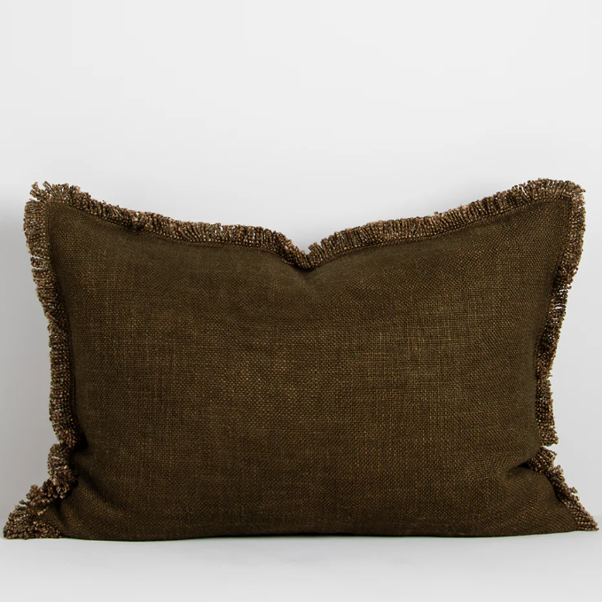 The Dover 40x60cm lumbar cushion features a thick woven texture in slate blue with soft fringing, adding warmth and understated style to any space.