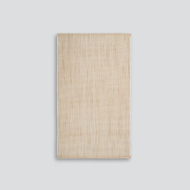 Eucalyptus entrance mat in soft green tones, handwoven from recycled PET yarn