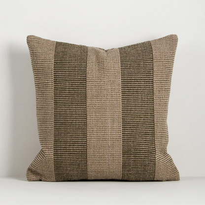 Shop the Baya Tide Outdoor Cushion at Comber and Comber. Handwoven from recycled PET with a textured linear design. Available in multiple colours.