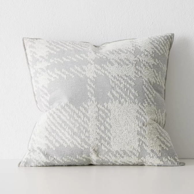 Sienne cushion with oversized check pattern and plush feather insert