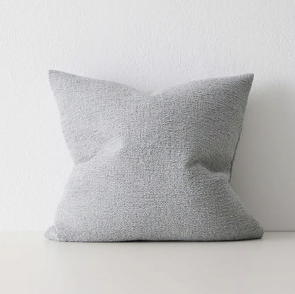 Shop the Laurent 50x50cm cushion – a rich chenille and dry yarn blend with subtle sheen, perfect for adding texture and elegance to contemporary interiors.