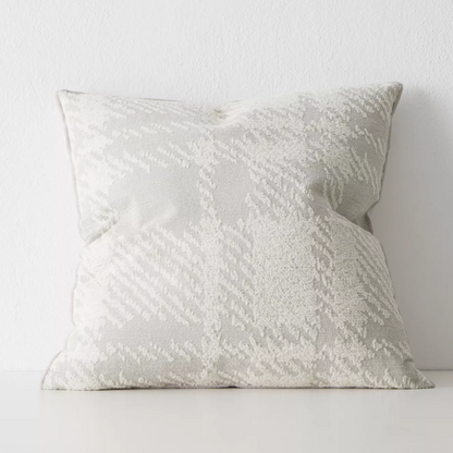 Sienne cushion with oversized check pattern and plush feather insert