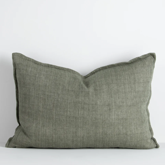 The Arcadia Cushion in warm mushroom linen is handwoven with a refined flange edge, offering timeless style and a relaxed contemporary feel.