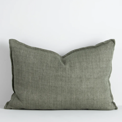 The Arcadia Cushion in warm mushroom linen is handwoven with a refined flange edge, offering timeless style and a relaxed contemporary feel.