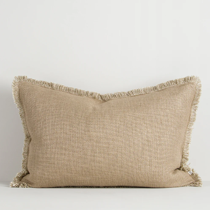 The Dover 40x60cm lumbar cushion features a thick woven texture in slate blue with soft fringing, adding warmth and understated style to any space.