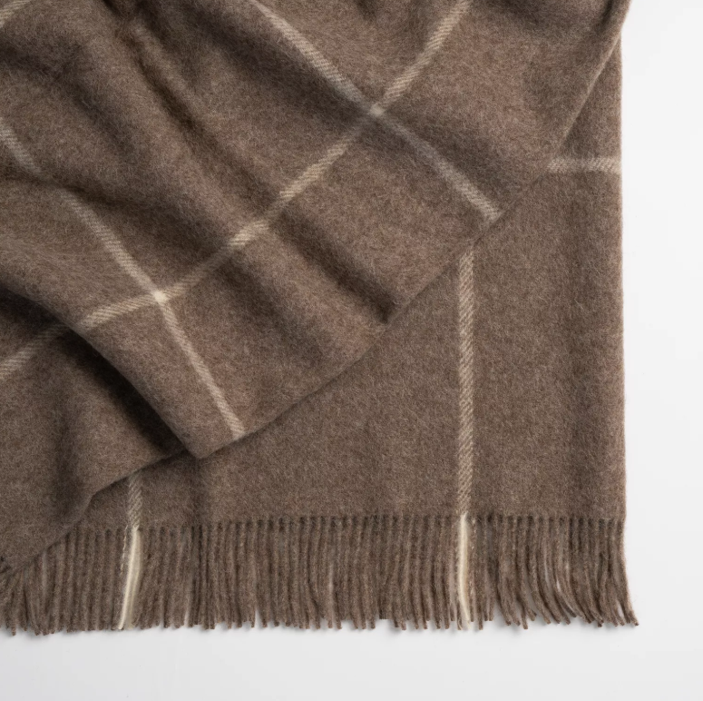 Shop the Ranfurly wool throw 140x240cm – a thick, warm check design inspired by the Maniototo region, perfect for timeless styling and cosy living.