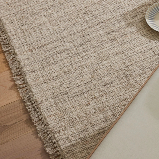 Close-up of plush pile and fringe on Puglia Fossil rug – BLACK Concept Store