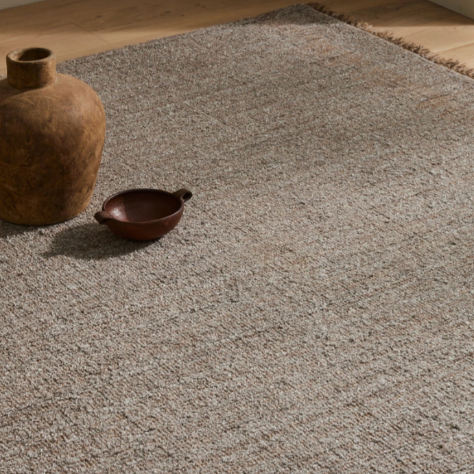 Elegant textured Puglia rug in muted brown, grey, and taupe tones – BLACK Concept Store