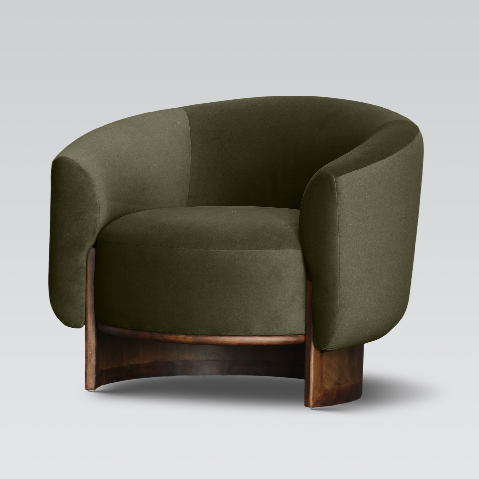 A refined club chair in rich olive mohair-look fabric, offering a sophisticated blend of comfort and contemporary style.