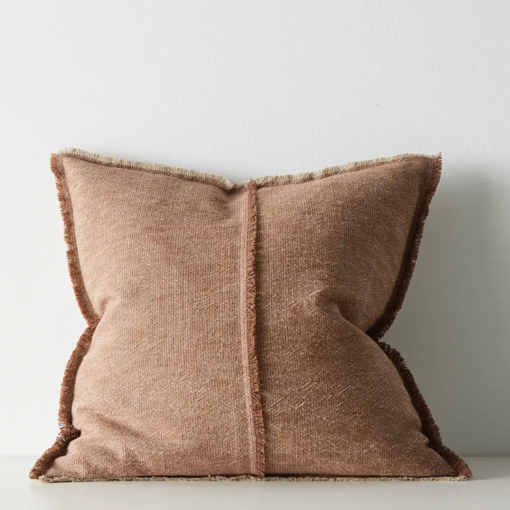 Shop the Adela cushion in 50x50cm or 40x60cm – a linen-cotton blend with textured weave and raw fringe detailing, perfect for layered contemporary styling.
