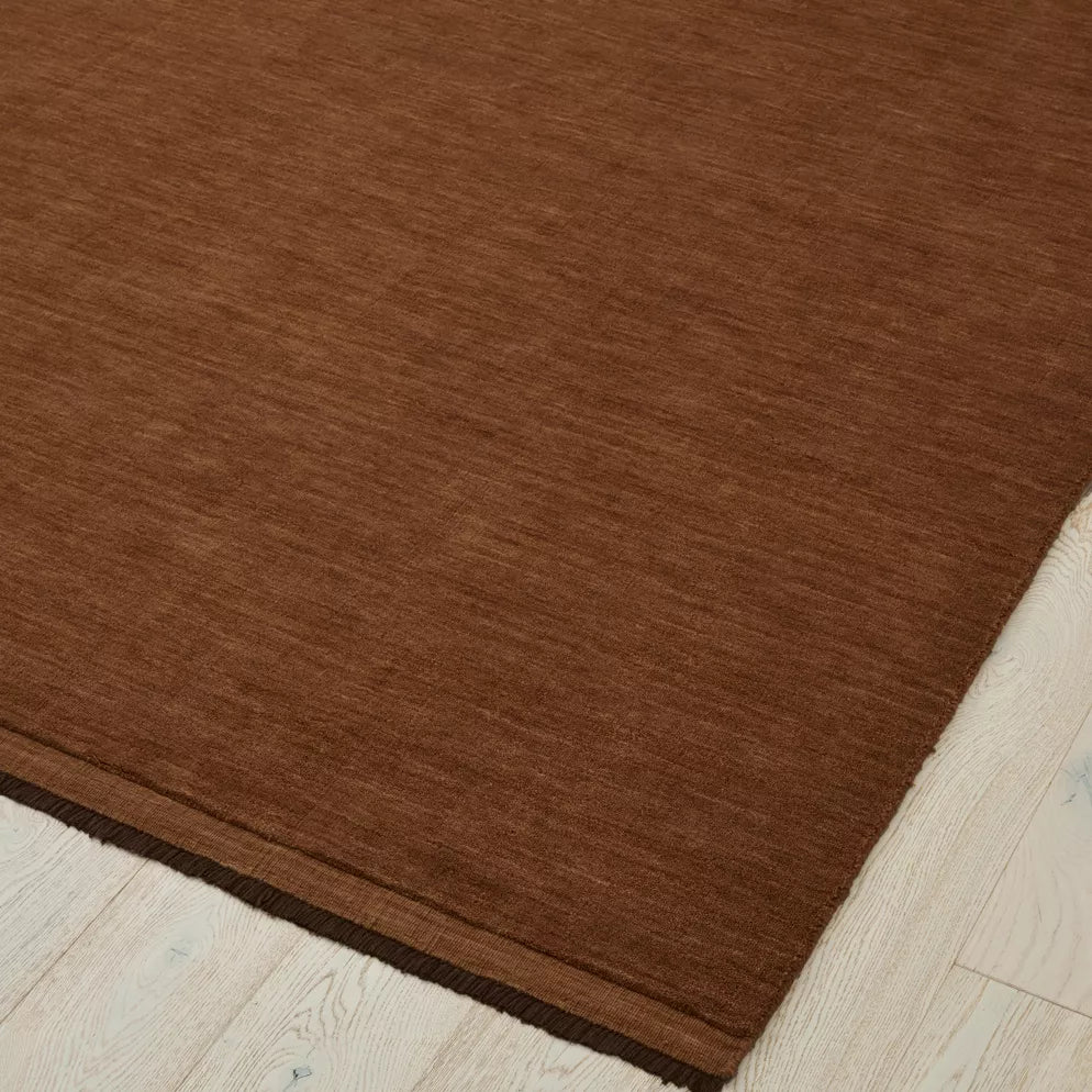 Sienna rug on a light wood floor. 2x3m 3x4m. 100% NZ wool