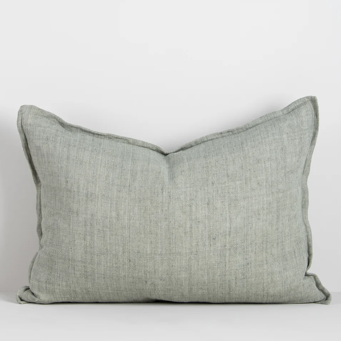 The Arcadia Cushion in warm mushroom linen is handwoven with a refined flange edge, offering timeless style and a relaxed contemporary feel.