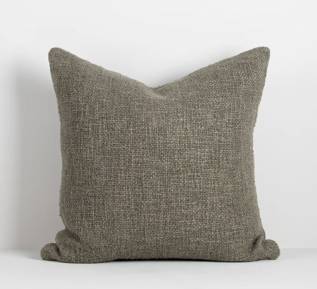 Modern artisan-style cushion in seasonal colour tones