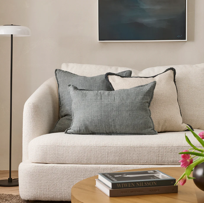 The Arcadia Cushion in warm mushroom linen is handwoven with a refined flange edge, offering timeless style and a relaxed contemporary feel.