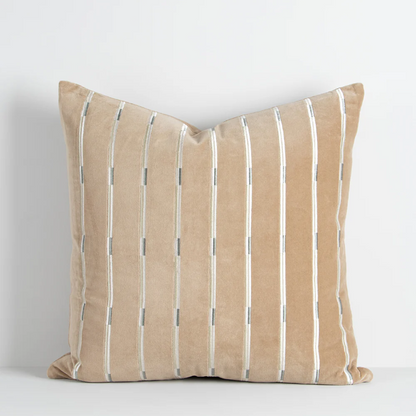 Baya Eden cushion adding texture and sophistication to a sofa
