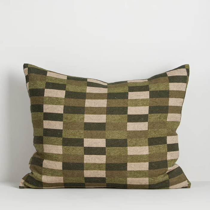 The Hugo 45x55cm lumbar cushion features a moss-green grid print on pure linen, blending natural tones with a contemporary graphic edge.