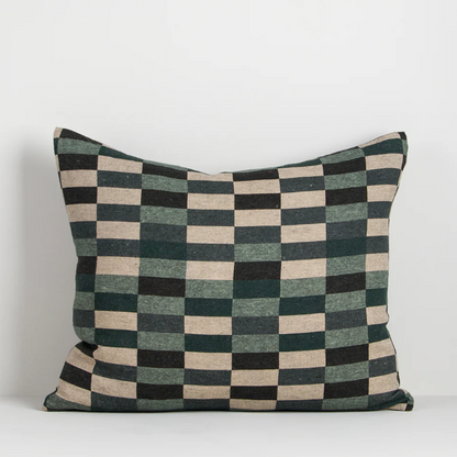 The Hugo 45x55cm lumbar cushion features a moss-green grid print on pure linen, blending natural tones with a contemporary graphic edge.
