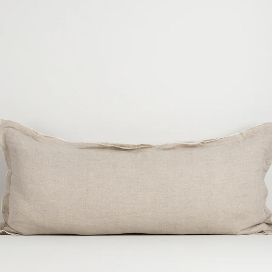 A luxurious elongated cushion crafted from 100% linen, featuring a refined double flange detail that brings texture, elegance, and effortless sophistication to any interior.