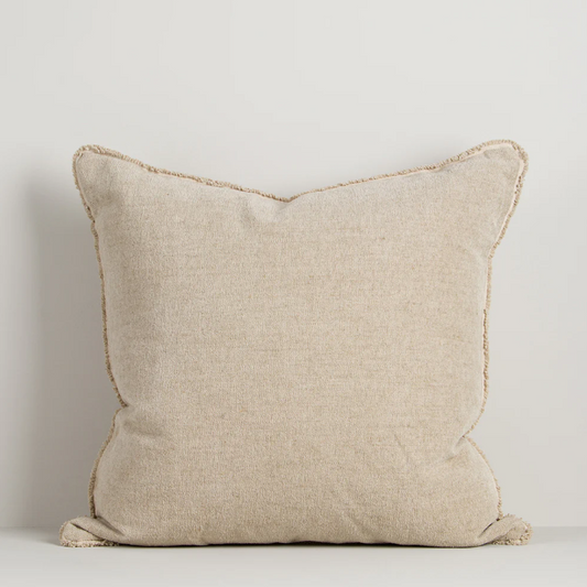 A luxurious cotton-linen chenille cushion featuring a soft velvety texture, refined border detailing, and rich earthy colourways designed to bring warmth and sophistication to contemporary interiors.