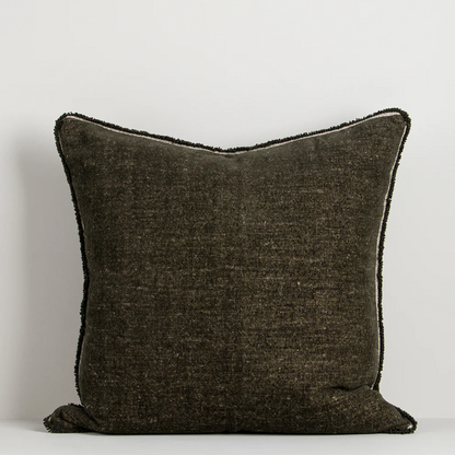 A luxurious cotton-linen chenille cushion featuring a soft velvety texture, refined border detailing, and rich earthy colourways designed to bring warmth and sophistication to contemporary interiors.