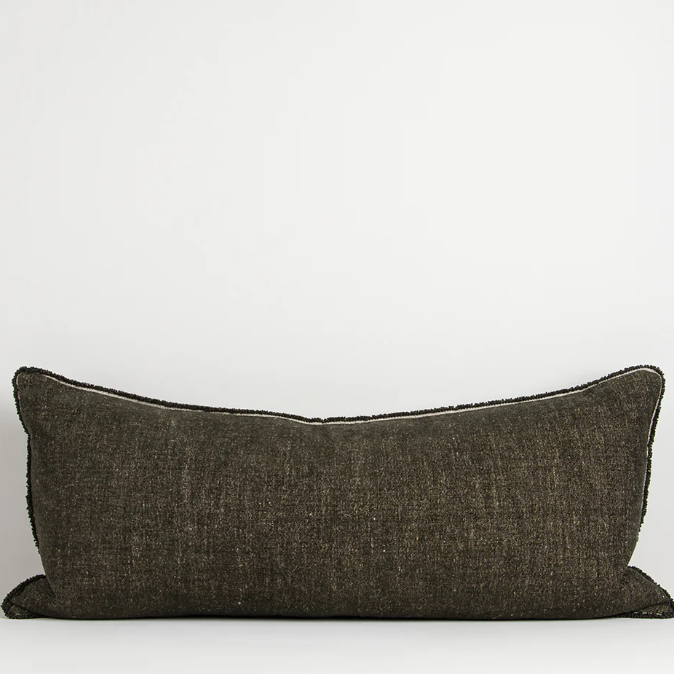 A luxurious cotton-linen chenille lodge cushion featuring a soft velvety texture, refined border detailing, and rich earthy colourways designed to bring warmth, comfort, and sophistication to contemporary interiors.