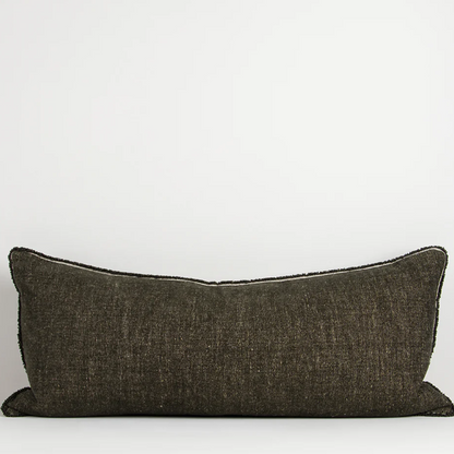 A luxurious cotton-linen chenille lodge cushion featuring a soft velvety texture, refined border detailing, and rich earthy colourways designed to bring warmth, comfort, and sophistication to contemporary interiors.