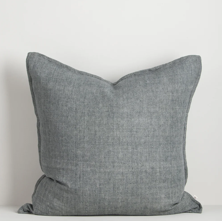 The Cassia 50x50cm cushion is handwoven from 100% linen with a refined flange edge, offering a timeless and contemporary accent for relaxed interiors.