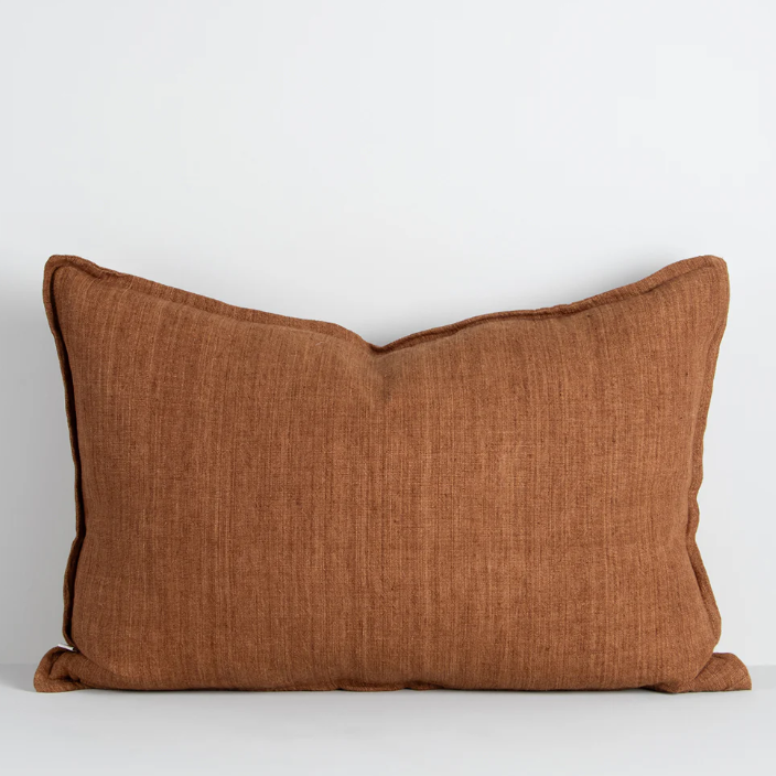 The Arcadia Cushion in warm mushroom linen is handwoven with a refined flange edge, offering timeless style and a relaxed contemporary feel.