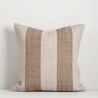 Shop the Baya Tide Outdoor Cushion at Comber and Comber. Handwoven from recycled PET with a textured linear design. Available in multiple colours.