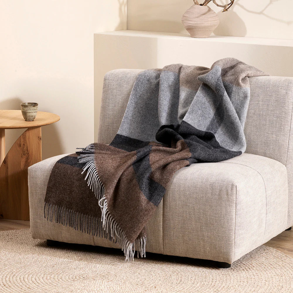 Offset Plaid Wool Throw in warm bark tones with twisted fringe