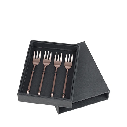 Set of four Cake forks in a black box 