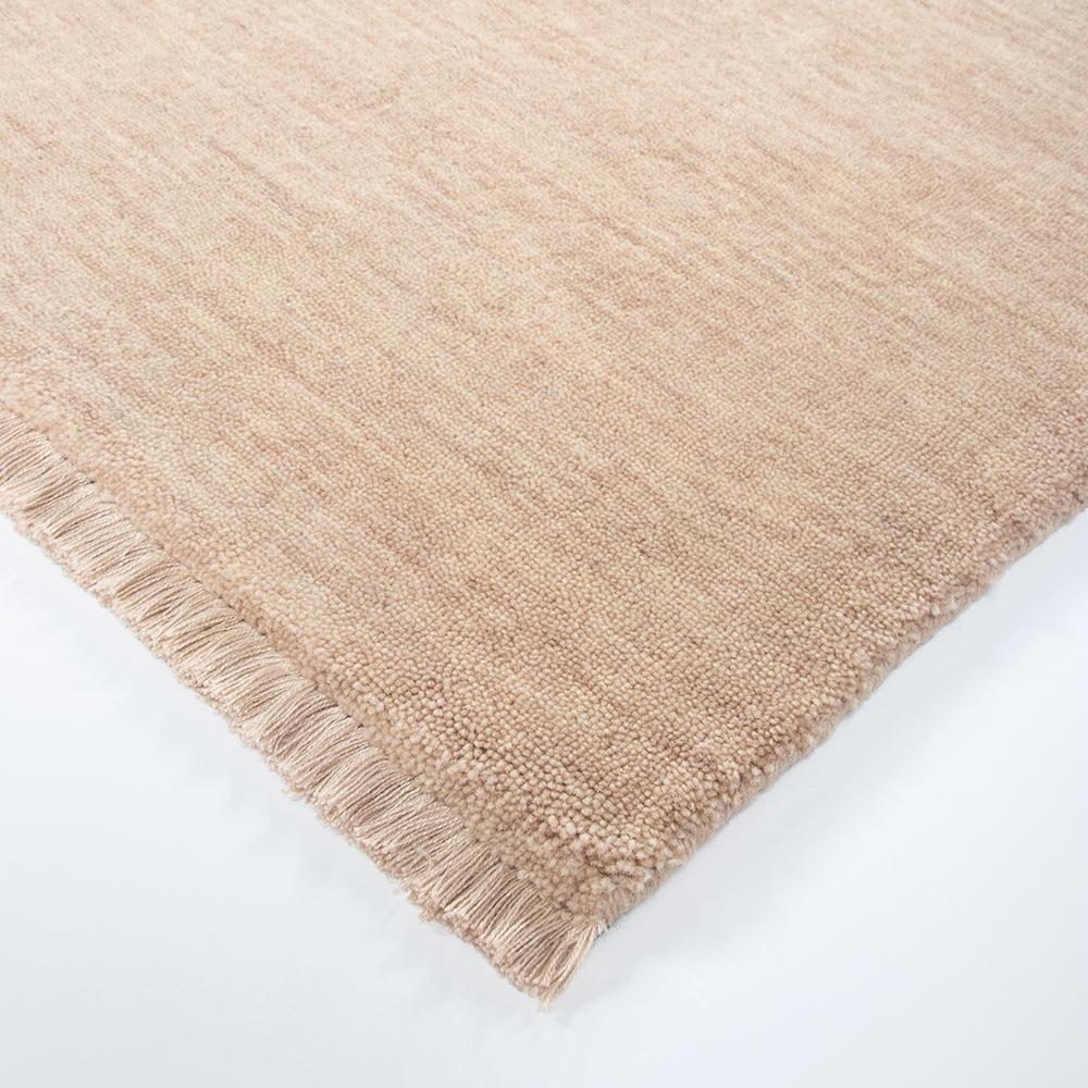 Luxury wool floor rug with delicate fringe detail in blush – BLACK Concept Store