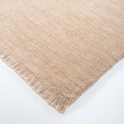 Luxury wool floor rug with delicate fringe detail in blush – BLACK Concept Store