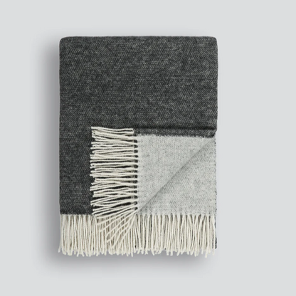 Casa Throw by Baya in charcoal with tasselled edge