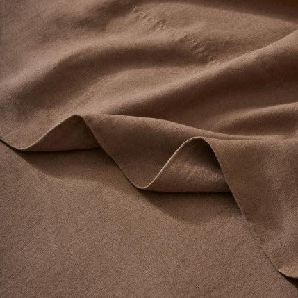 Soft prewashed linen sheet set in neutral tones