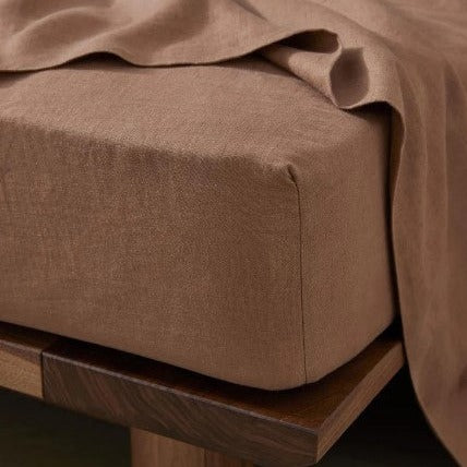 Soft prewashed linen sheet set in neutral tones