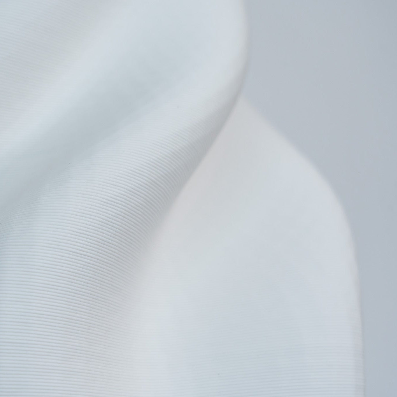 Discover the Bella Small Vase in white – a contemporary 3D printed ceramic piece with a sculptural silhouette, perfect for modern styling and decorative displays.
