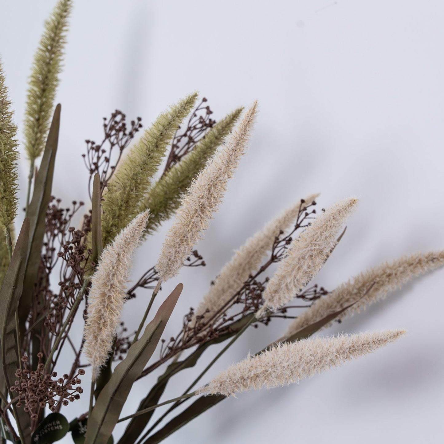 Shop 94 cm Cream Fountain Grass – a realistic faux plant with soft plumes, ideal for adding natural texture and height to home décor.