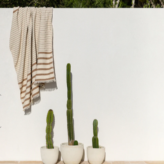 Handwoven eco-friendly throw made from recycled PET yarn