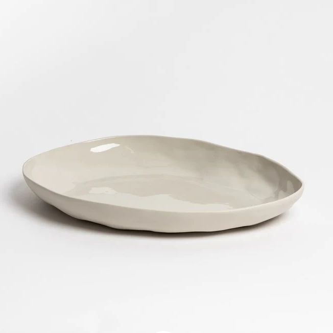 Durable stoneware serving platter with organic shape