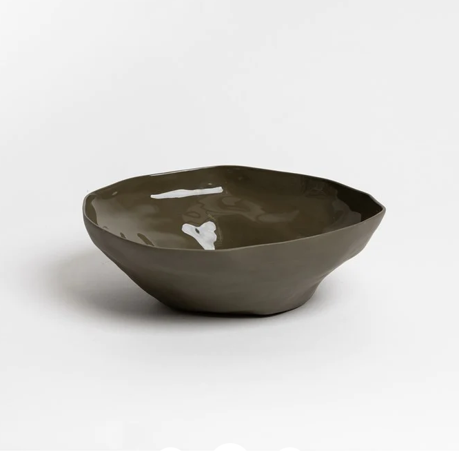 Durable stoneware bowl with organic shape and natural palette