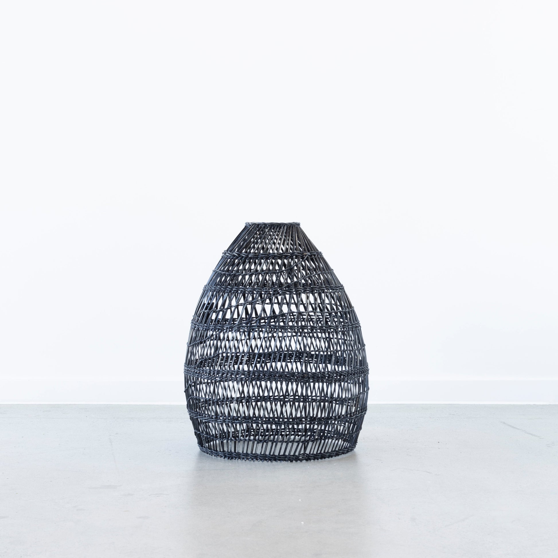 Peeled rattan light shade on display