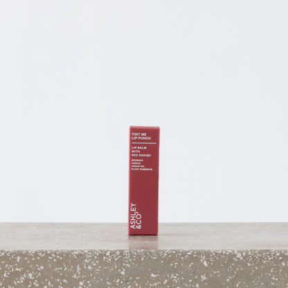 Tint Me Lip Punch red radish tinted balm in tube