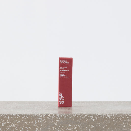 Tint Me Lip Punch red radish tinted balm in tube