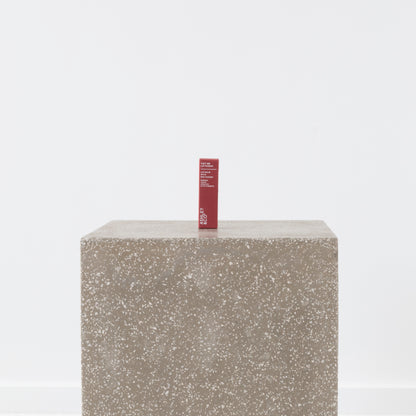 Close-up of natural beeswax lip balm texture