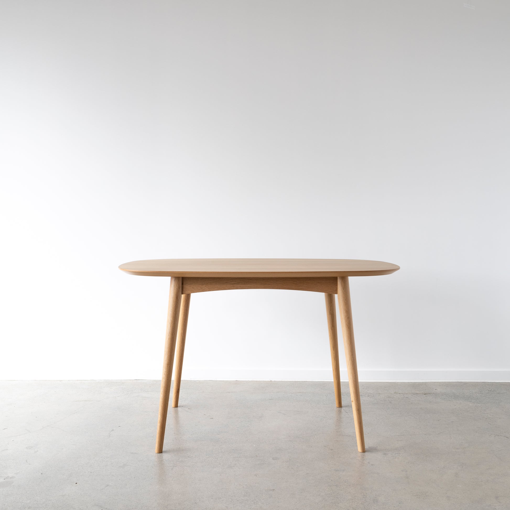 Malin Dining Table with solid oak legs and oak veneer top