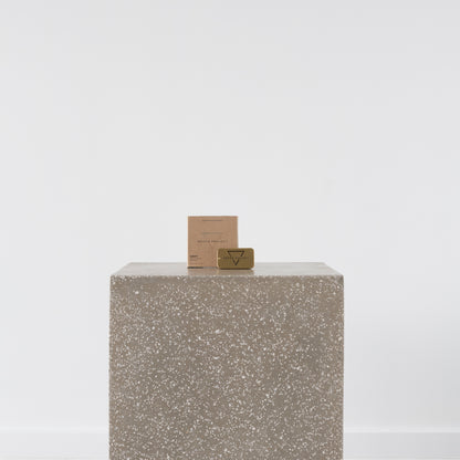 Close-up of Bergamot, Vetiver, Lime, and Pepper ingredients