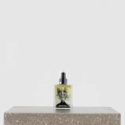 Close-up of Becca Body Oil being applied to skin