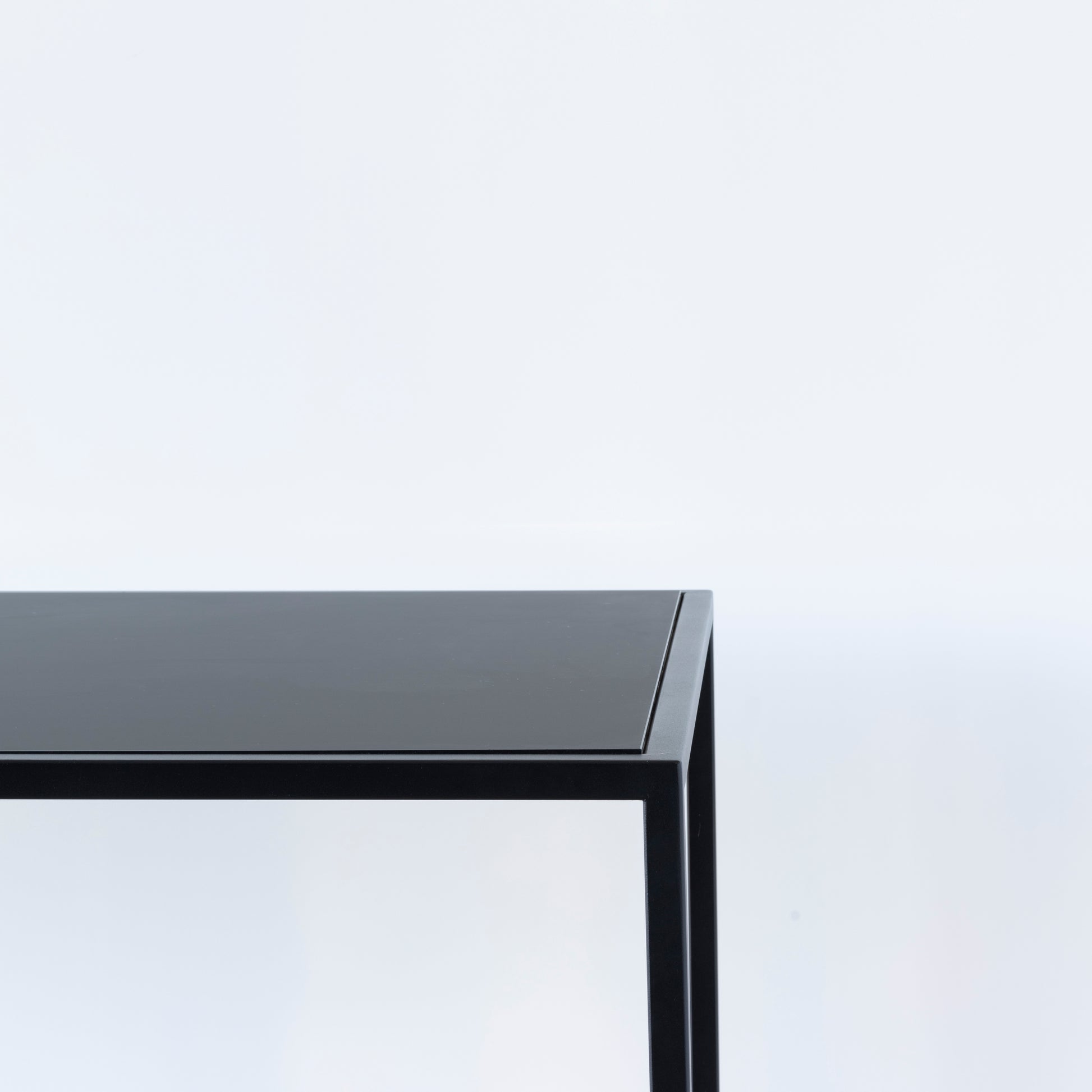 Modern Nero Range table for stylish dining spaces
